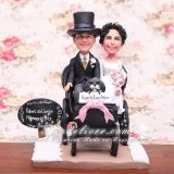 Bride and Groom Sitting in Carriage Wedding Cake Toppers