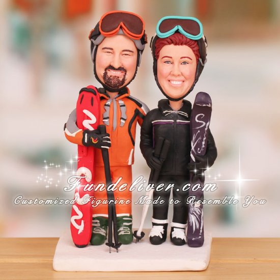 Couple Dressed Up in Ski Jackets and Ski Helmets Cake Toppers - Click Image to Close