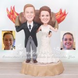 Tar Barrel Cake Topper with Bride and Groom Holding Flaming Barrel on a Stump
