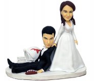 "Follow Me" Bride Dragging Groom Wedding Cake Topper "Follow Me" Bride Dragging Groom Wedding Cake Topper