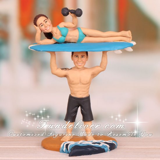 Groom Holding Bride Up on Surfboard Cake Toppers - Click Image to Close