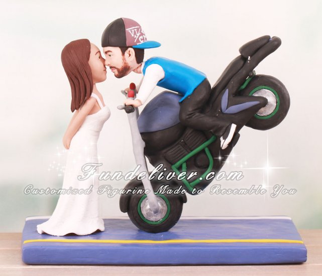 Groom Doing Stoppie Kissing Bride Cake Toppers - Click Image to Close
