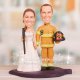 Bride Hold Shotgun and Firefighter Cake Toppers