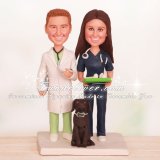 Nurse In Scrubs Holding Clipboard Wedding Cake Toppers