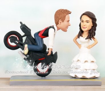 Motorcycle Wedding Cake Topper with Groom Doing a Stoppie in a Soccer Jersey