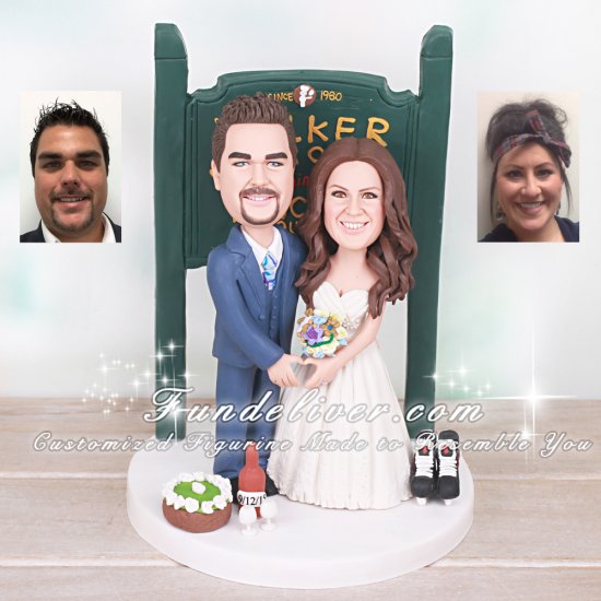 Bride and Groom in Front of Sign with Wine and Skates Cake Toppers - Click Image to Close