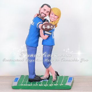 Detroit Lions Cake Topper with Bride and Groom Hugging on a Football Field