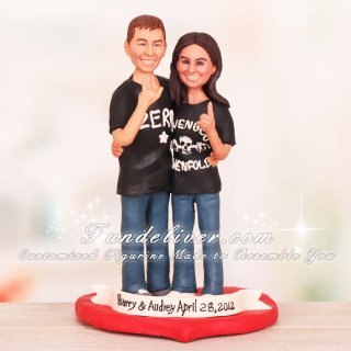Couple in Rock Out Stance Wedding Cake Toppers