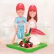 Phillie Phanatic on 4 Wheeler in Front of Bride and Groom Cake Toppers