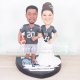 Oakland Raiders Cake Topper with Bride and Groom in Jerseys and Raiders Logo Base Oakland Raiders Cake Topper with Bride and Groom in Jerseys and Raiders Logo Base