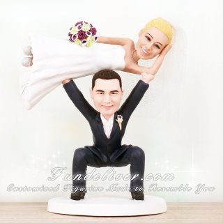 Funny Cake Decorations with Groom Lifting Bride Like a Barbell