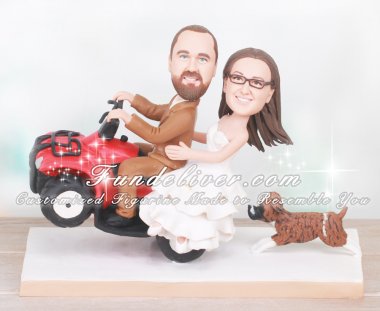 ATV Cake Topper with Groom Giving Bride a Ride on 4 Wheeler While a Dog Chases